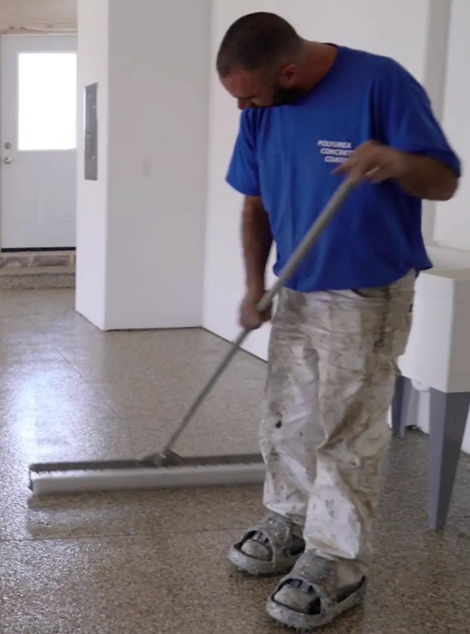 Sean applying a polyaspartic topcoat